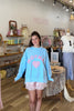 Blue, gingham heart and “MOTHER” embroidered in pink sweatshirt with crew neckline and fleece lining. Oversized and slightly cropped.

By The Beach Club