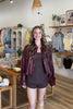 Burgundy red, leather jacket with crop fit, functional buttons, front pockets, and collar | Pixelated Boutique, Statement Jacket, Fall Fashion, Stylish Women’s Jacket, Fall Outerwear, Autumn Fashion, Fall Outfits Women, Fall Fashion 2026, Faux Leather Jacket, Women’s Jackets, Women’s Layering Pieces, Fall Outerwear Women