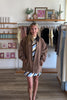 Brown, barn jacket with vintage wash, corduroy collar, side pockets, and hem buckles