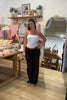 Brown, wide leg sweatpants with low rise waist, drawstring, side pockets, and fleece lining