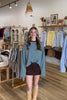 Blue and brown, striped top with long sleeves, drop shoulder, and oversized fit