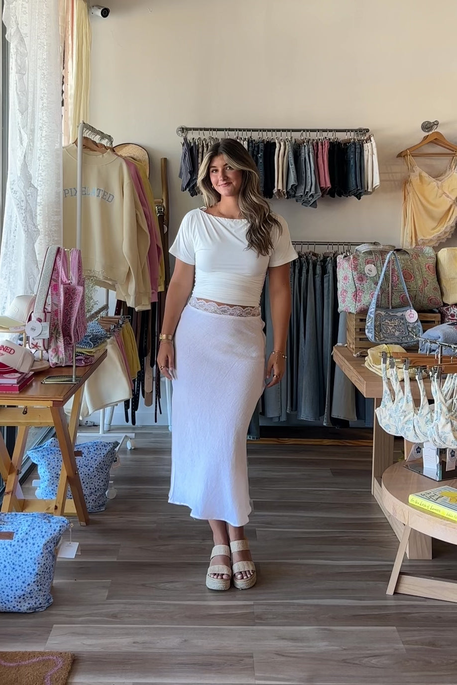 White, linen midi skirt with lace trim, lined interior, elastic waistband, and side zipper | Pixelated Boutique, 757 Boutique, Virginia Beach Clothing Stores, Lace skirt, Linen skirt, Lace maxi skirt, Business casual midi skirt, white midi skirt, white lace skirt, vacation outfits