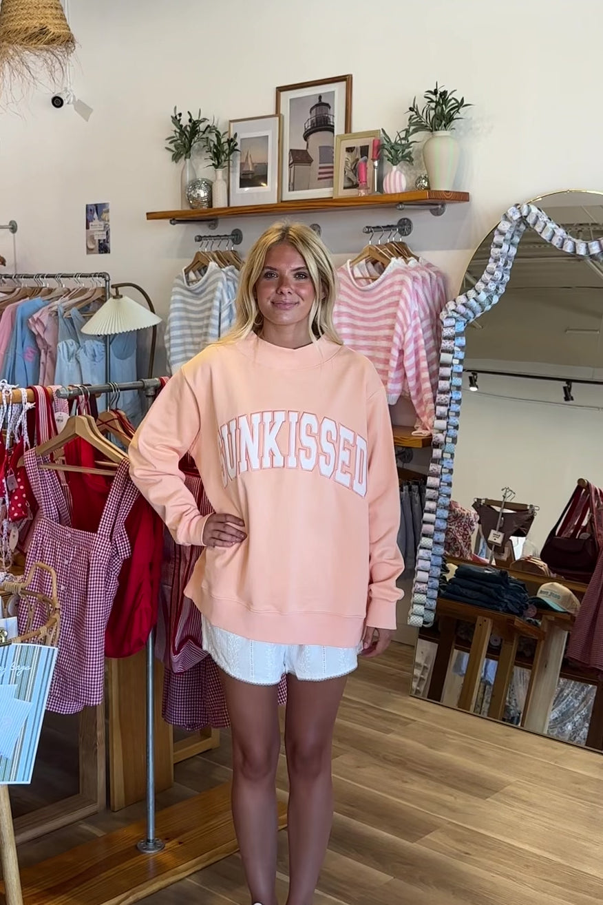 Orange, embroidered sweatshirt with mock neckline and oversized fit. By Sunkissed Coconut | Pixelated Boutique,  Virginia Beach Boutique, 757 Boutique, Online Shopping for Women, Oversized Sunkissed Sweatshirt, Mock Neck Sweatshirt, Summer Sweatshirt