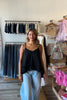 Black, swing cami top with V neckline, asymmetric hem, ruffled chiffon layers, back tie, and adjustable straps
Pixelated Boutique, Women's Clothing, Virginia Beach Clothing Stores, Clothing Stores in Virginia Beach, Virginia Beach Boutique, 757 Boutique, Online Shopping for Women, summer aesthetic, brunch outfit, vacation style, vacation outfits, beach boutique, beach fashion, beach outfits, women’s boutique clothing, boutique clothing for women, coastal cowgirl outfits, coastal aesthetic clothing, business